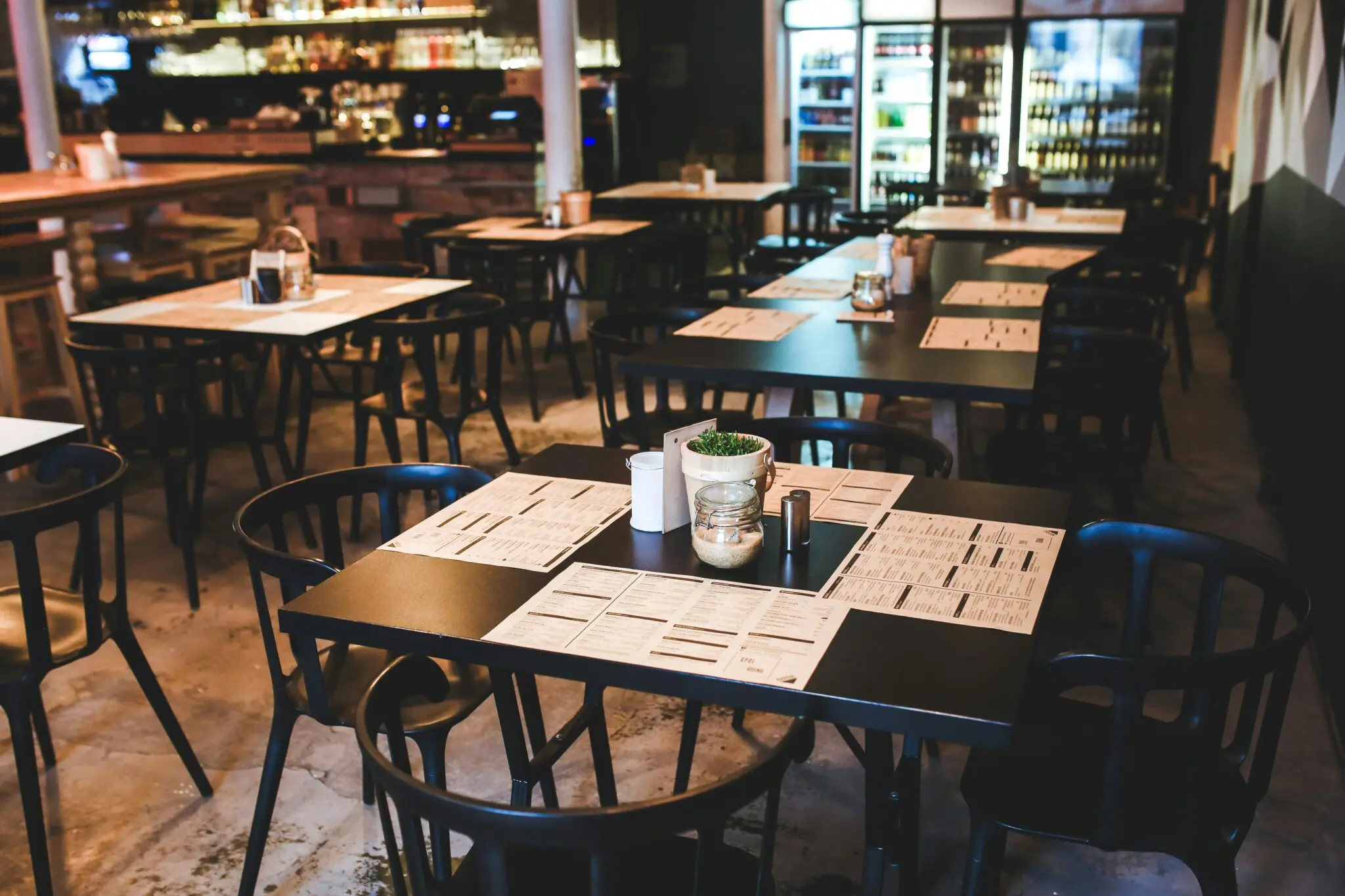 table in restaurant with menus