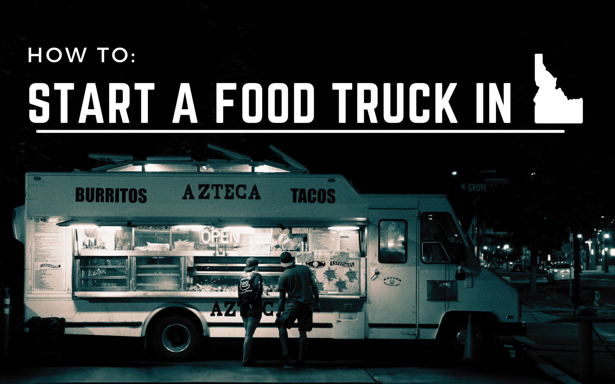 Customers ordering at Azteca Tacos food truck in Idaho at night.